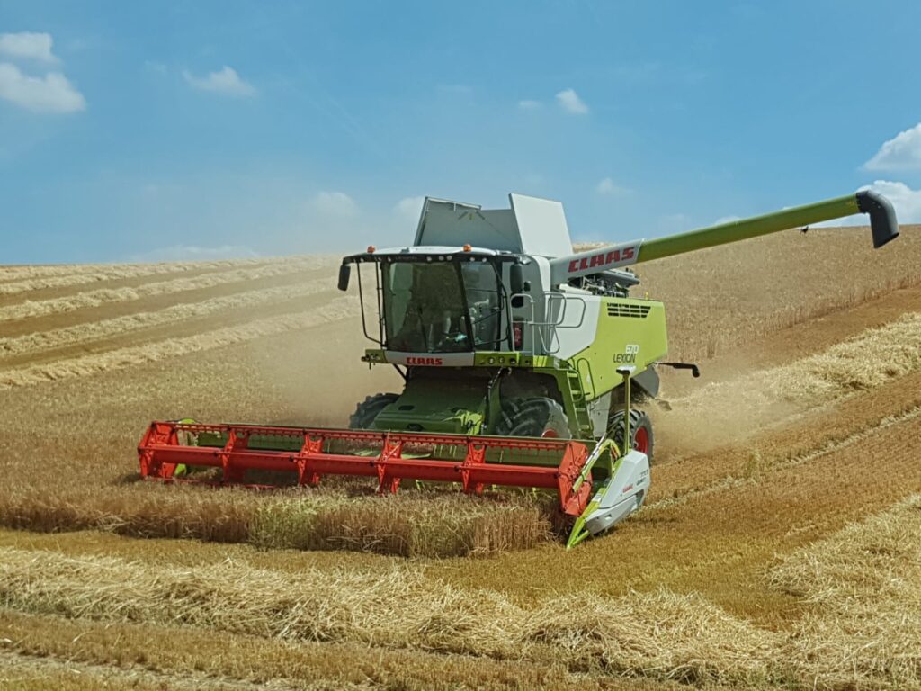 Combine harvester at work in a field